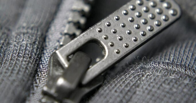 extreme close-up of a zipper on a black sports jacket
