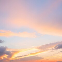 Obraz premium 夕焼けの淡いオレンジと水色の爽やかな空