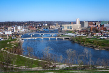 Cedar Rapids, Iowa, USA daytime city view with Cedar River and bridges.