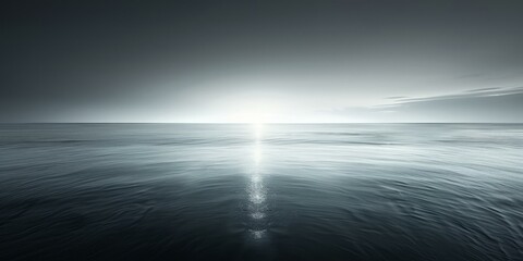 b'dark sea surface with bright sun reflecting off the water' - obrazy, fototapety, plakaty