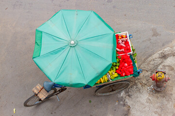Selling Fruit In A Cargo Tricycle On The Street Of Ho Chi Minh City, Vietnam.
