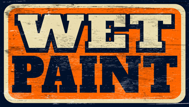 Aged and worn wet paint sign on wood