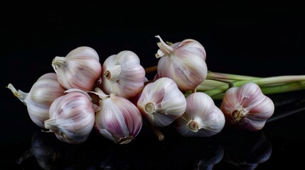 Close-up of fresh garlic cloves, emphasizing the health-promoting compound allicin, ideal for health awareness, isolated background, studio lighting