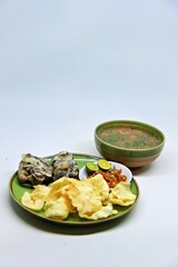 Fried Beef Oxtail with Sambal Balado. Boiled beef oxtail until tender, fried until slightly crispy and served with fresh spicy balado chili sauce.