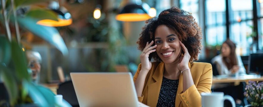 Businesswoman makes phone calls while working in the office