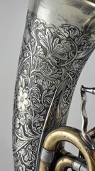 The delicate engravings and etchings on a French horn bell