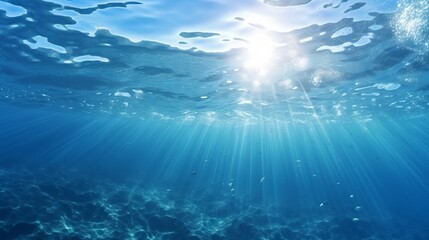 Small canyon underwater carved by the swell into the fore reef with sunlight through water surface