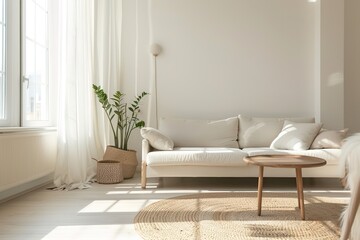 Bright living room with a cozy white sofa, round wooden coffee table, and green plants.