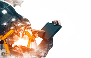 MLB Mechanized industry robot arm and factory worker double exposure. Concept of robotics...