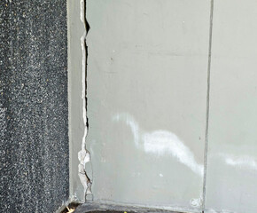 Cracks or collapse of building columns are caused by earthquakes.