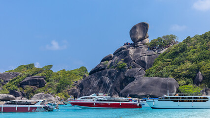 Similan Islands with famous Sail Rock, Tropical islands of ocean blue sea water and white sand beach Andaman Sea, Phang Nga, Thailand.