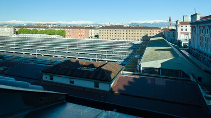 Views of the city of Turin surrounded by snow-capped mountains