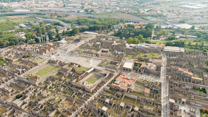 Pompeii, Italy. Pompeii is a large ancient Roman city, now a large-scale archaeological complex....