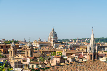 Fototapeta na wymiar Rome, Italy. Dome of the Basilica of Saints Ambrogio and Carlo al Corso. Panorama of Rome. Morning hours