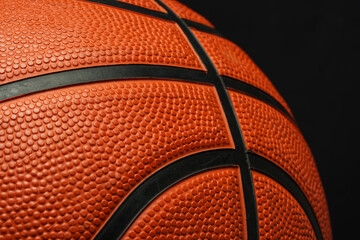 Naklejka premium Close Up of Basketball on Black Background