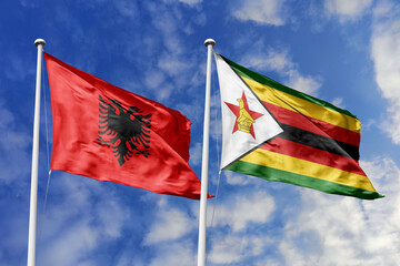 3d illustration. Albania and Zimbabwe Flag waving in sky. High detailed waving flag. 3D render. Waving in sky. Flags fluttered in the cloudy sky.