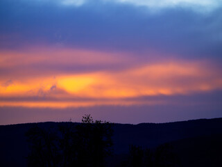 Sunset over the Ore Mountains in Czach Republic. Colorful sky.