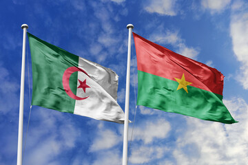 3d illustration. Algeria and Burkina Faso Flag waving in sky. High detailed waving flag. 3D render. Waving in sky. Flags fluttered in the cloudy sky.
