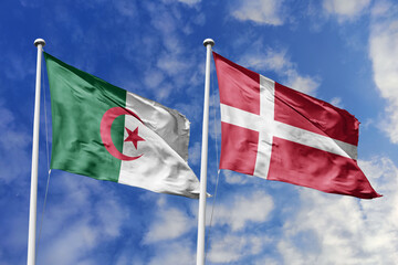 3d illustration. Algeria and Denmark Flag waving in sky. High detailed waving flag. 3D render. Waving in sky. Flags fluttered in the cloudy sky.