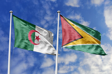 3d illustration. Algeria and Guyana Flag waving in sky. High detailed waving flag. 3D render. Waving in sky. Flags fluttered in the cloudy sky.