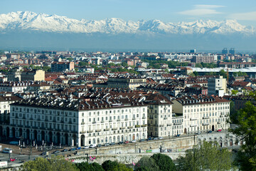 Views of the city of Turin surrounded by snow-capped mountains