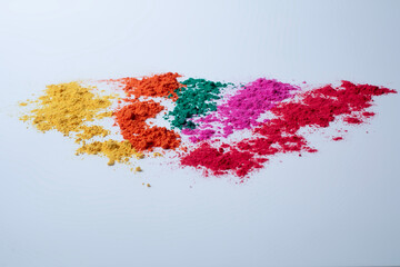 Multi color holi powder isolated on white background.