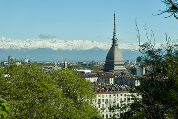 Views of the city of Turin surrounded by snow-capped mountains