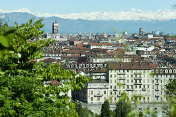 Views of the city of Turin surrounded by snow-capped mountains