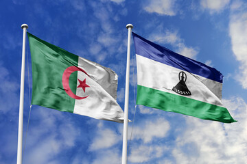3d illustration. Algeria and Lesotho Flag waving in sky. High detailed waving flag. 3D render. Waving in sky. Flags fluttered in the cloudy sky.