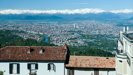 Views of the city of Turin surrounded by snow-capped mountains