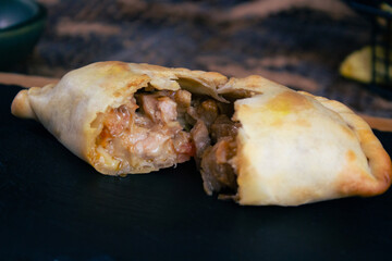 Delicious Argentinian chicken spawns, crispy dough, juicy filling, Argentinian food