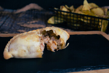 Delicious Argentinian chicken spawns, crispy dough, juicy filling, Argentinian food