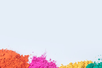 Pile of multicolored holi powder isolated on white background