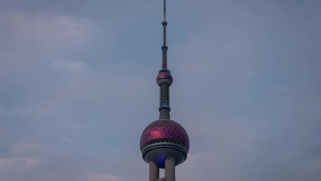 Time lapse clip of the Oriental Pearl TV Tower in Pudong District in Shanghai, China seen at night