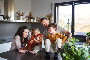 Happy family enjoying time together in the kitchen