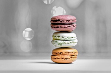 "Macarons, delicate shells with luscious fillings, a symphony of flavors and colors, indulgence in every bite, a French delicacy to savor."


