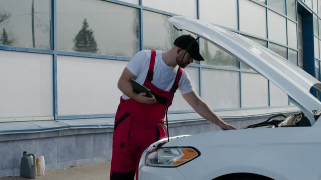 Auto mechanic doing inspection malfunctioning car examining each part to diagnose issues. Auto mechanic ensures comprehensive inspection laying groundwork for effective repairs after inspection.