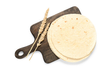 Wooden cutting board with fresh lavash and ears of wheat on white background