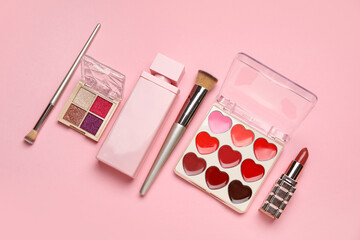 Set of makeup cosmetics on pink background. Top view