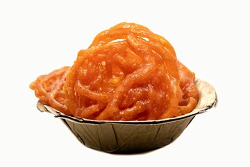 Jalebi or Jilapi a in Disposal Leaves Bowl Isolated on White Background with Copy Space, Also Known as Zalabia or Mushabak