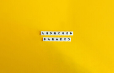 Androgen Paradox Phrase. Text on Block Letter Tiles on Yellow Background. Minimalist Aesthetics. - obrazy, fototapety, plakaty