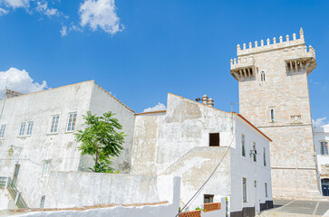 houses and castle tower built with marble in the medieval village of Estremoz, Alentejo Region,...