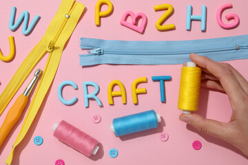 The word "craft" is made of colored plasticine, laid out on a pink background.