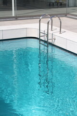 Obraz na płótnie Canvas swimming pool water wave sunshine