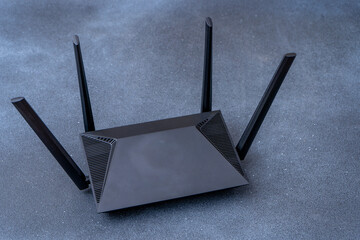 Router for connecting and distributing Wi-Fi Internet. Black background