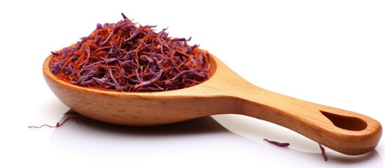 Wooden spoon with abundant saffron