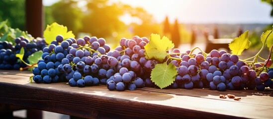 Fototapeta premium Grapes on Wooden Table
