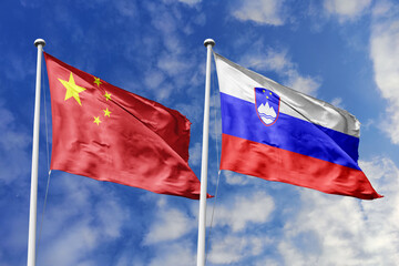 3d illustration. China and Slovenia Flag waving in sky. High detailed waving flag. 3D render. Waving in sky. Flags fluttered in the cloudy sky.