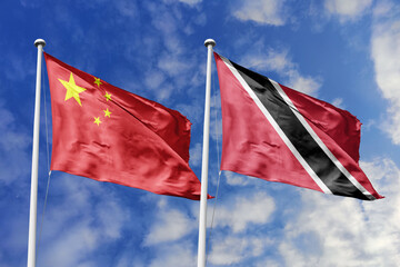 3d illustration. China and Trinidad and Tobago Flag waving in sky. High detailed waving flag. 3D...