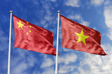3d illustration. China and Vietnam Flag waving in sky. High detailed waving flag. 3D render. Waving in sky. Flags fluttered in the cloudy sky.